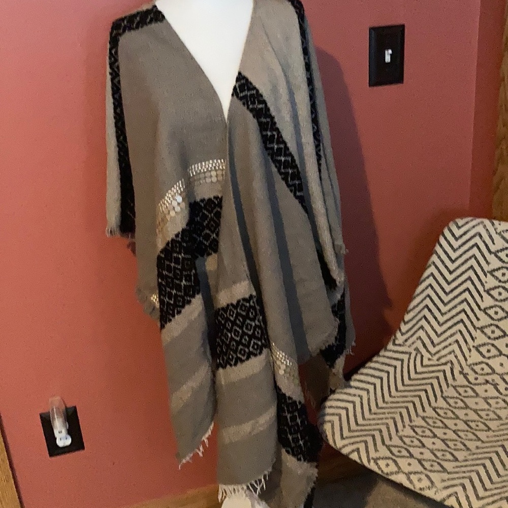 Grey and black poncho
